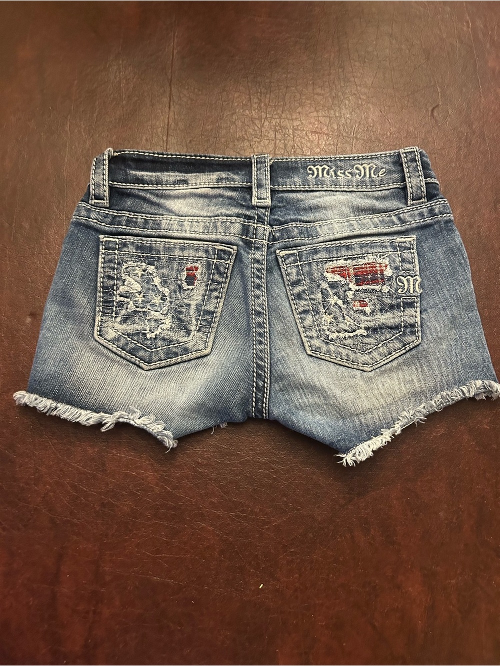 Miss Me Light Blue Distressed Denim Shorts with Embroidered Pockets